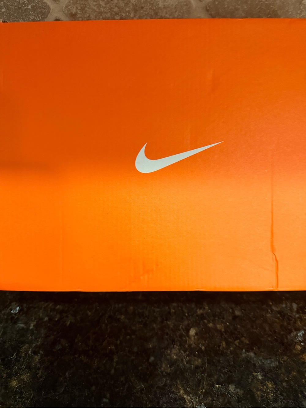 Nike Orange Box with White Swoosh Logo